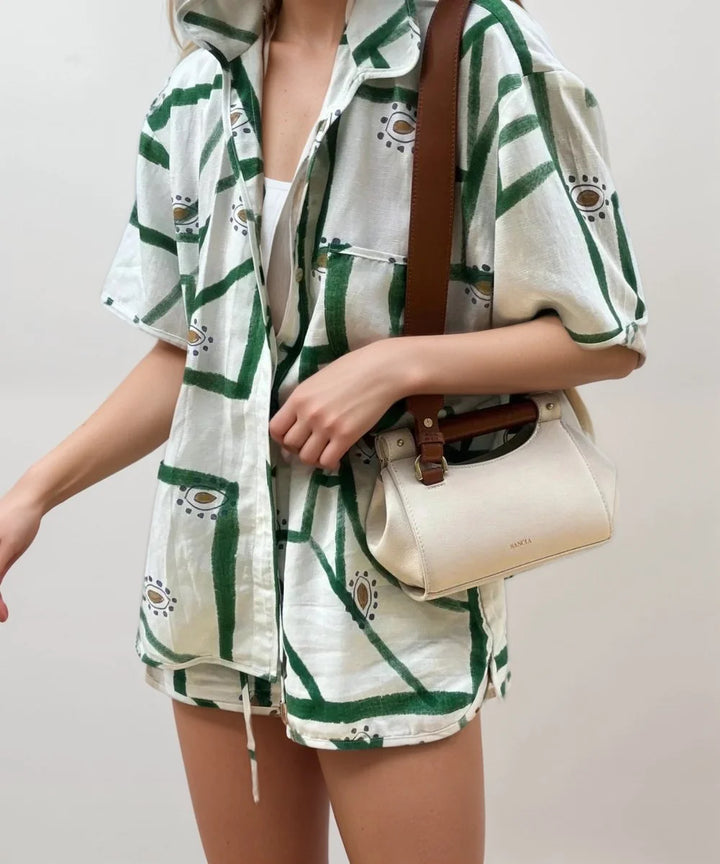Green and white printed short sleeve summer set made of soft and comfy material, perfect for warm days.
