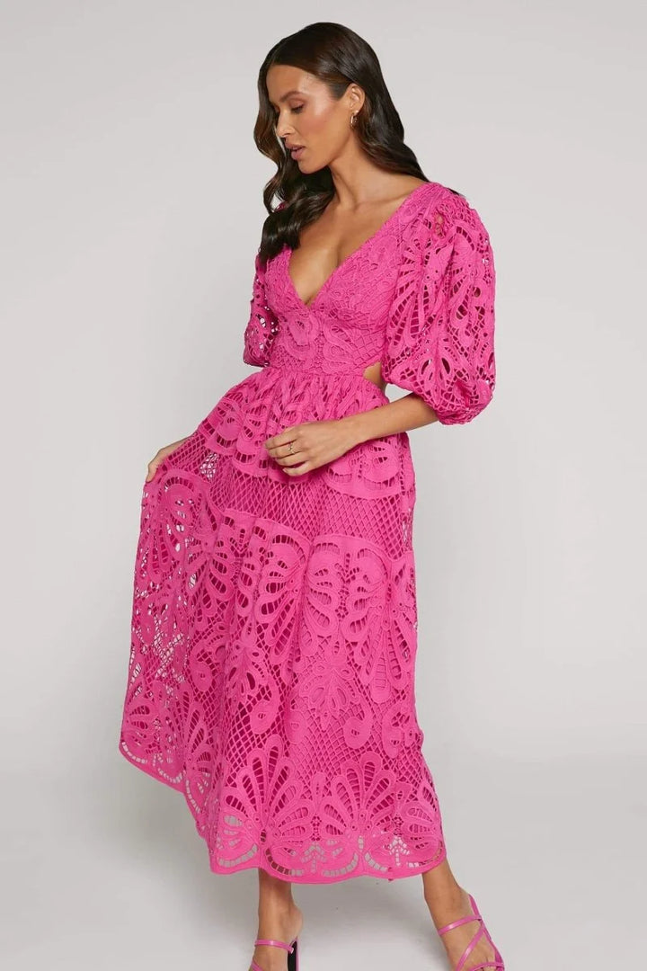 Mid-length lace dress in navy blue, featuring a flattering V-neckline and delicate lace detailing.