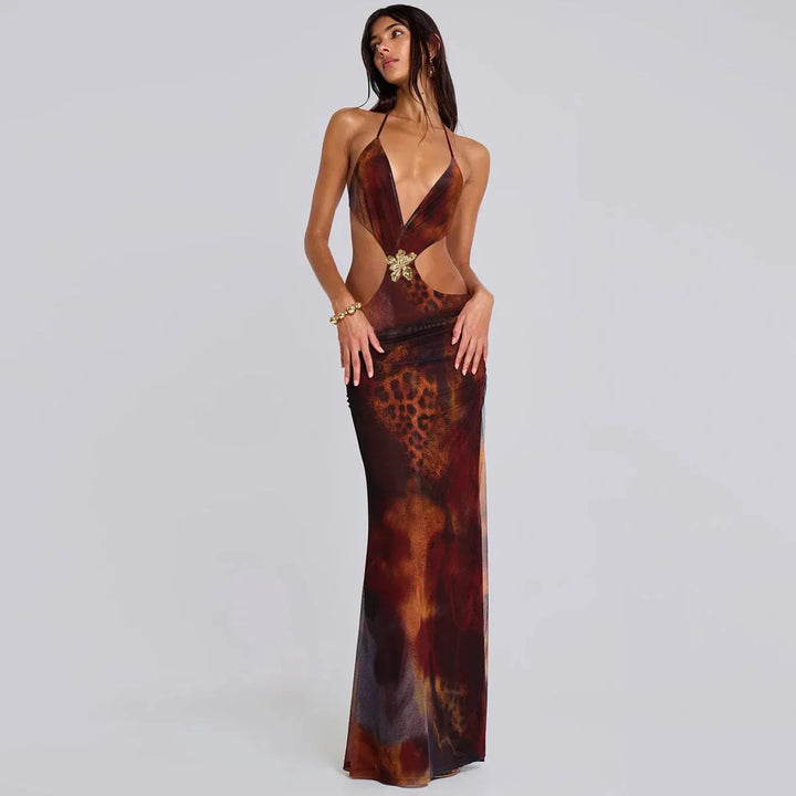 Brown slim-fit maxi dress with gold detail, featuring a ribbed knit fabric and high neckline, perfect for casual or formal…
