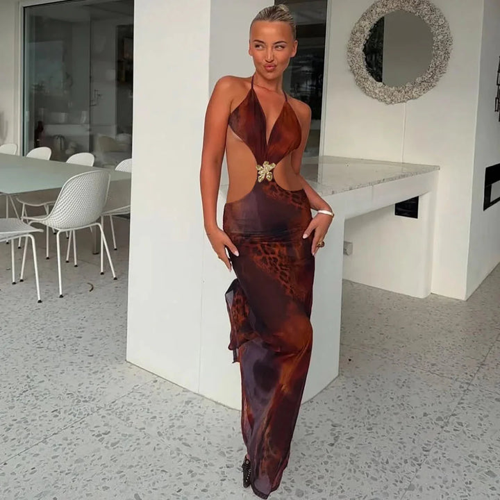 Brown slim-fit maxi dress with gold detail, elegant design perfect for any occasion, made from high-quality fabric for a…