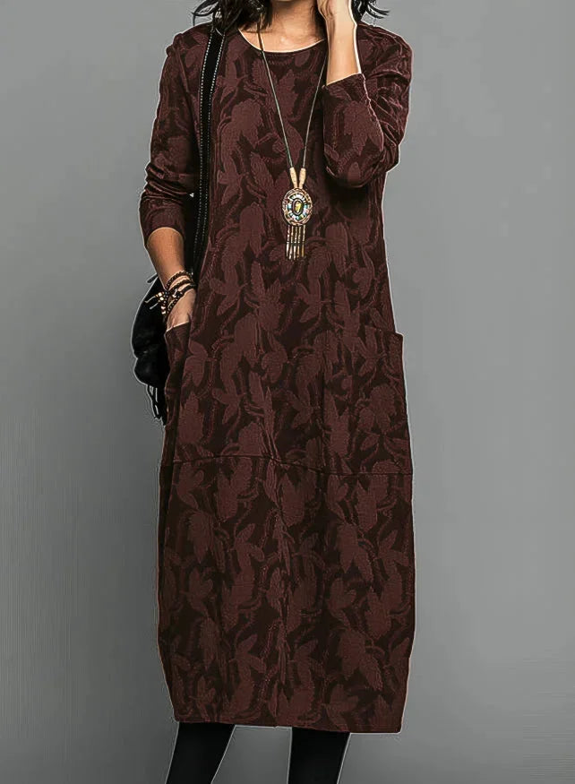 "Gwyneth midi dress in textured jacquard fabric, featuring pockets. Elegant and stylish design for any occasion."