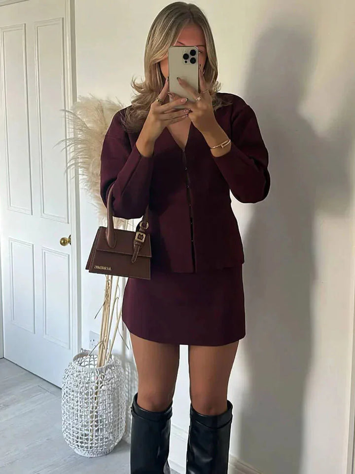 Two-piece skirt and jacket set in a chic design with a modern twist, perfect for everyday wear or special occasions.