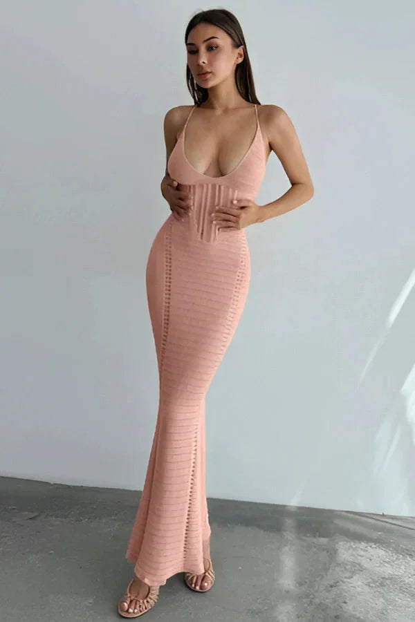 Pink maxi dress for women with plunging neckline and flowy skirt. Made of soft fabric perfect for everyday casual wear.