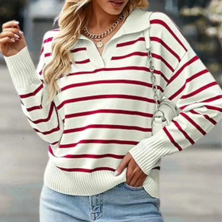 Red striped zip-up collared pullover made of soft cotton blend, perfect for casual outfits or layering in cooler weather.