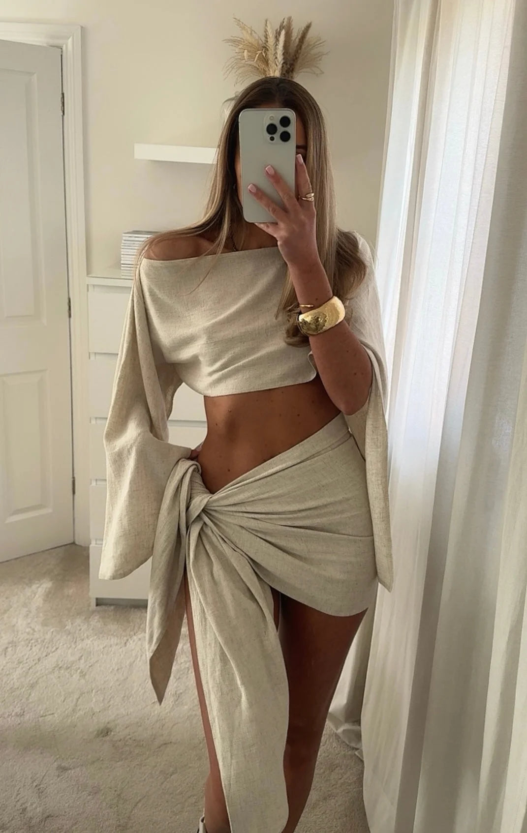 Two-piece linen sarong set by Hallee in a chic design, perfect for casual outings or beach days.