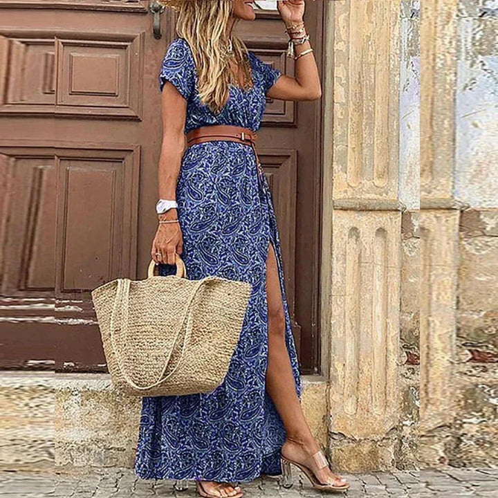 Blue V-neck floral print maxi dress with belt, made of lightweight chiffon. Perfect for summer days or casual occasions.