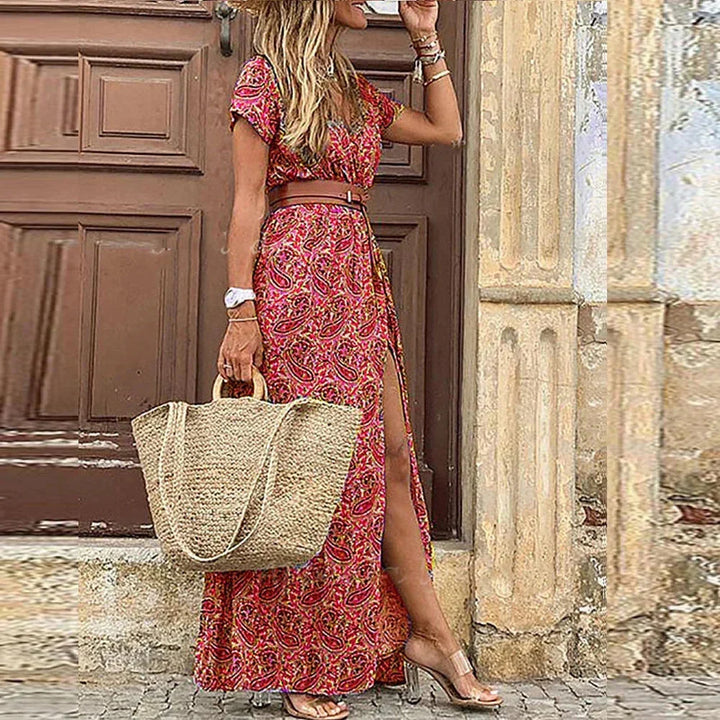 Dark Red V-neck maxi dress with floral print and belt. Made from lightweight fabric, perfect for a chic and casual look.