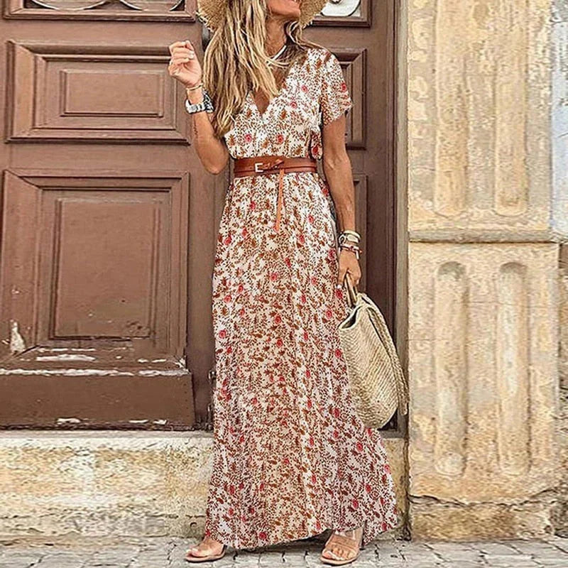 Red V-neck maxi dress with floral print and belt, perfect for summer days. Made of lightweight and breathable fabric for a…