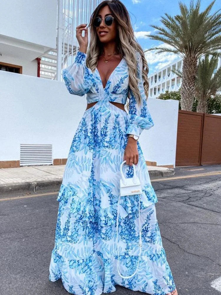 Blue flowy maxi dress with beautiful floral print, perfect for a casual yet stylish look. Made from lightweight and…