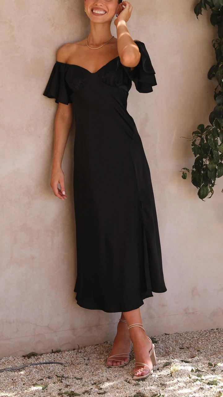 Off-shoulder maxi dress with slits in lightweight fabric perfect for summer; relaxed, flowy fit and stylish design named…