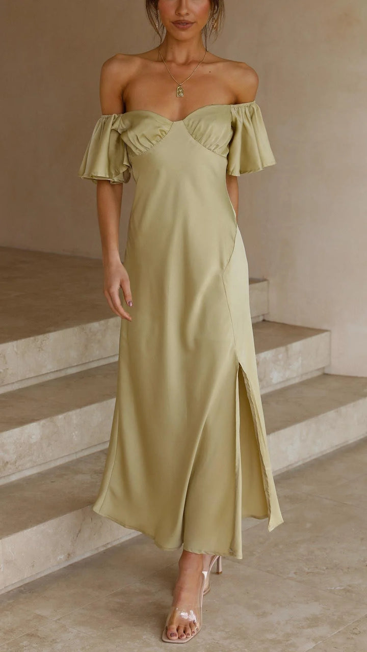 Flowy olive off-shoulder maxi dress with slits, made of lightweight fabric, perfect for a breezy summer day out.