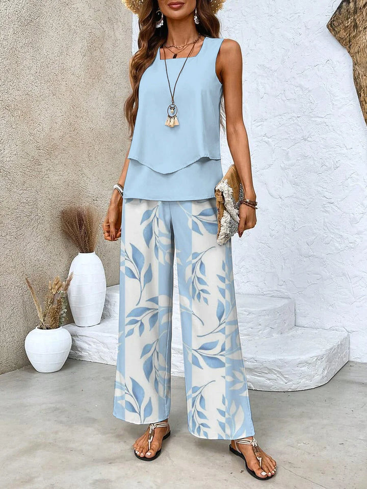 Sleeveless top and printed pants set in lightweight cotton blend fabric with modern design.