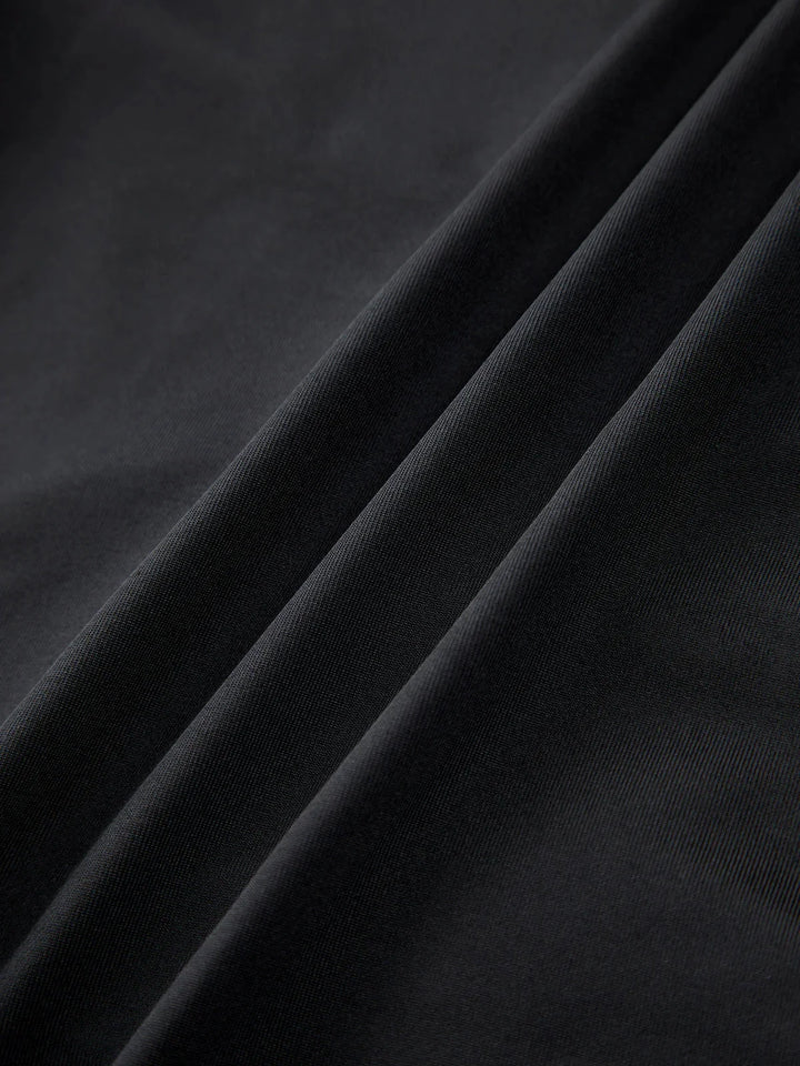 Strapless black top with sweetheart neckline, a timeless and elegant design for versatile styling.