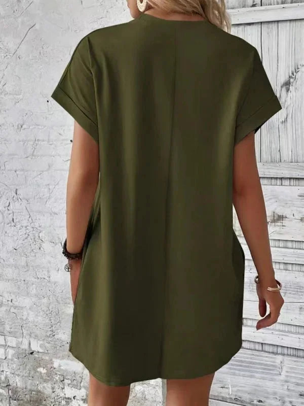Navy blue mini dress with pockets made of soft cotton blend, perfect for everyday comfort and style by Ilani.