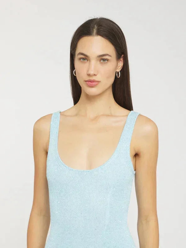 Sleeveless fitted maxi dress in icy blue with a flattering silhouette and elegant design.