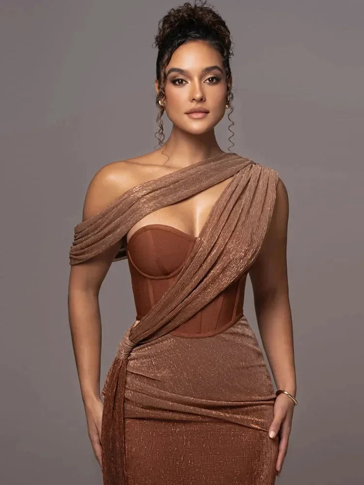 Black shimmering evening dress with an asymmetrical hem, perfect for special occasions.
