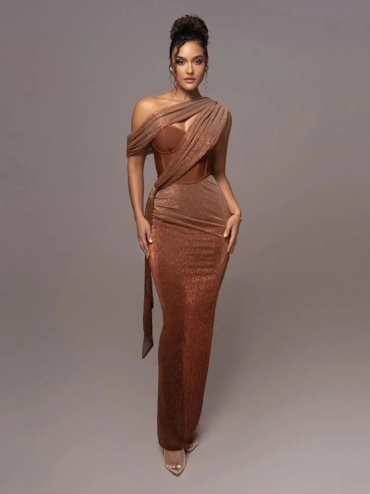 Brown asymmetric evening dress with shimmering textures. A true standout with its unique design and elegant finish.