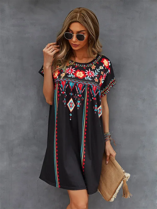 Embroidered boho mini dress with intricate details and flowy silhouette by Jaclyn.