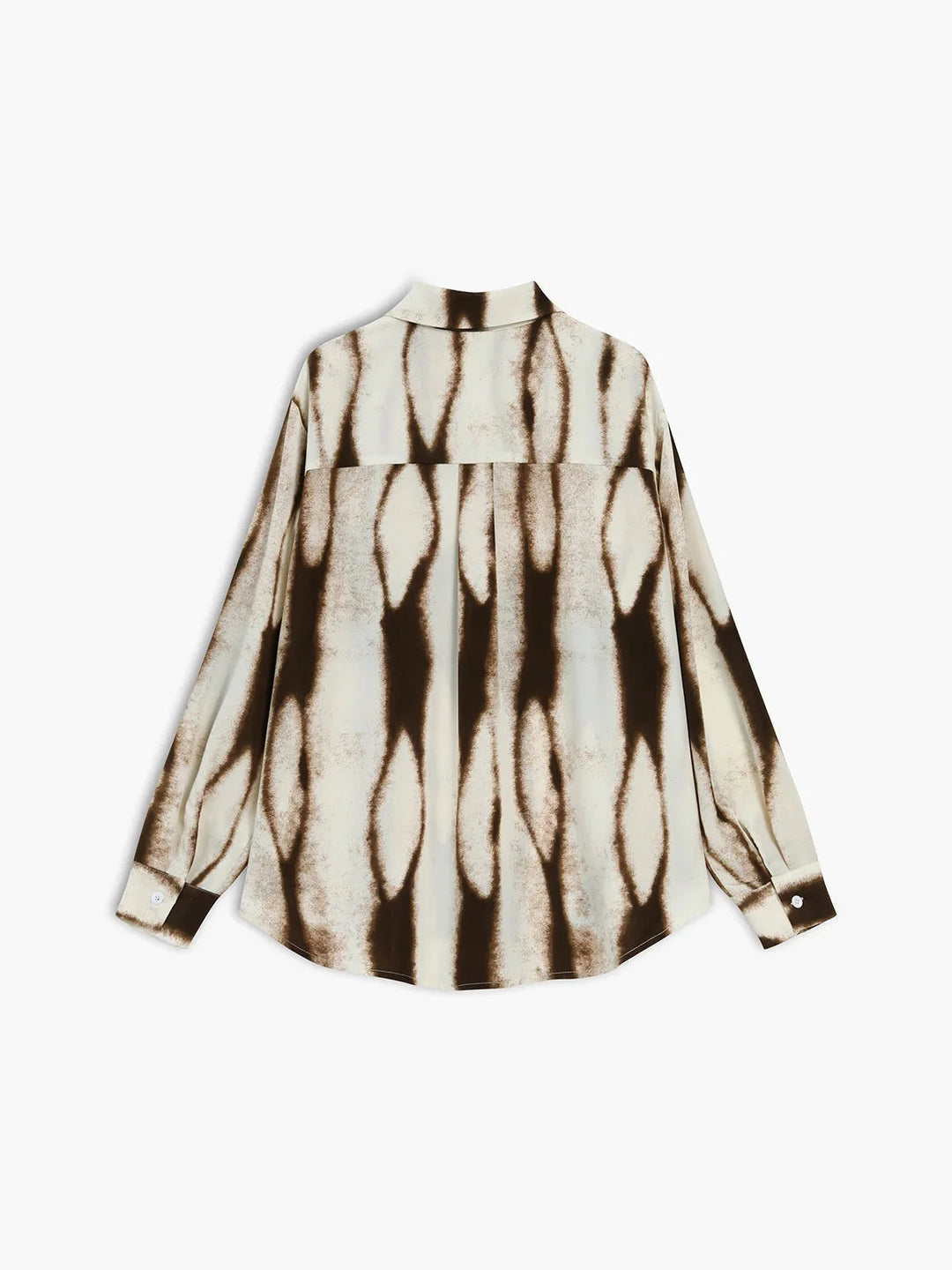 Abstract print button-up blouse by Jada. Features a stylish and unique design with a blend of polyester and viscose fabrics.