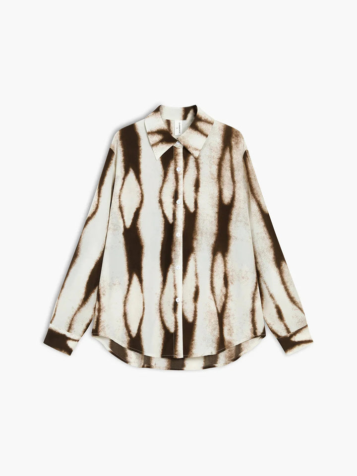Brown abstract print button-up blouse with a stylish design. Made of soft and comfortable fabric for a chic look.