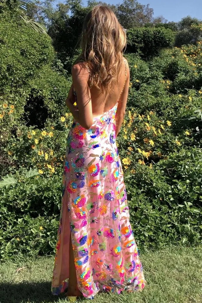 "Janessa floral dress in soft cotton blend with a thigh-high slit, perfect for a casual day out or special occasion."