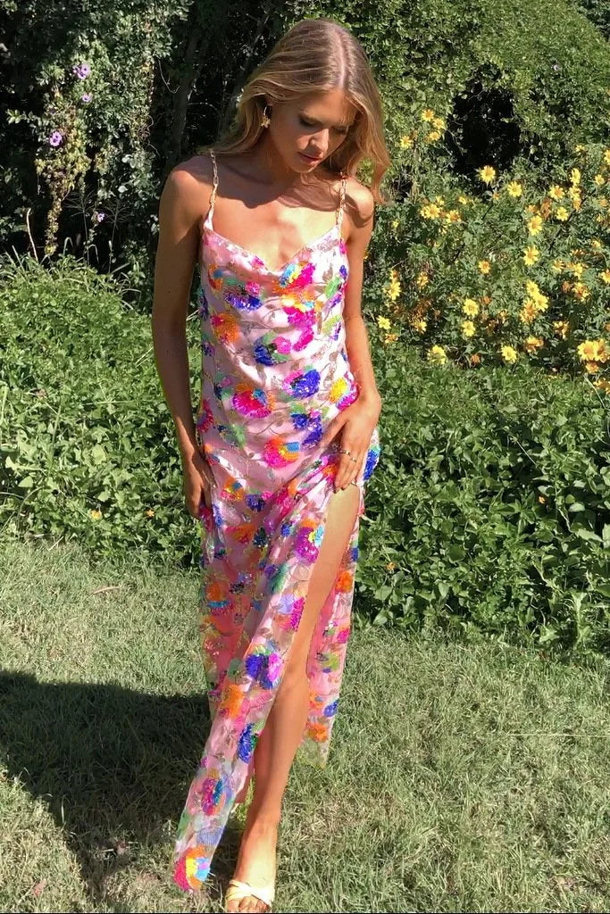Pink floral dress with leg slit. Made of soft cotton blend fabric. Flowy and stylish design perfect for a casual or formal…