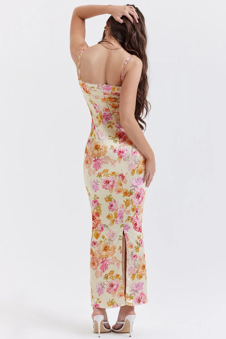 Yellow floral print maxi dress made with soft cotton blend fabric, fitted style.