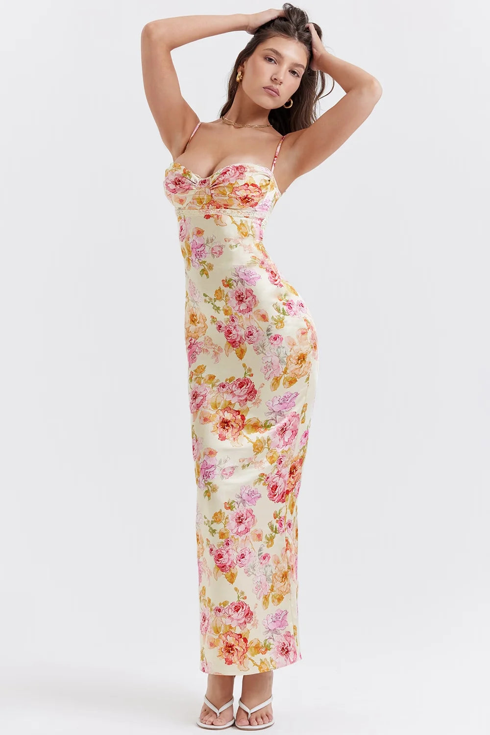 "Yellow maxi dress featuring vibrant floral print, fitted silhouette, ideal for spring and summer, made with lightweight…