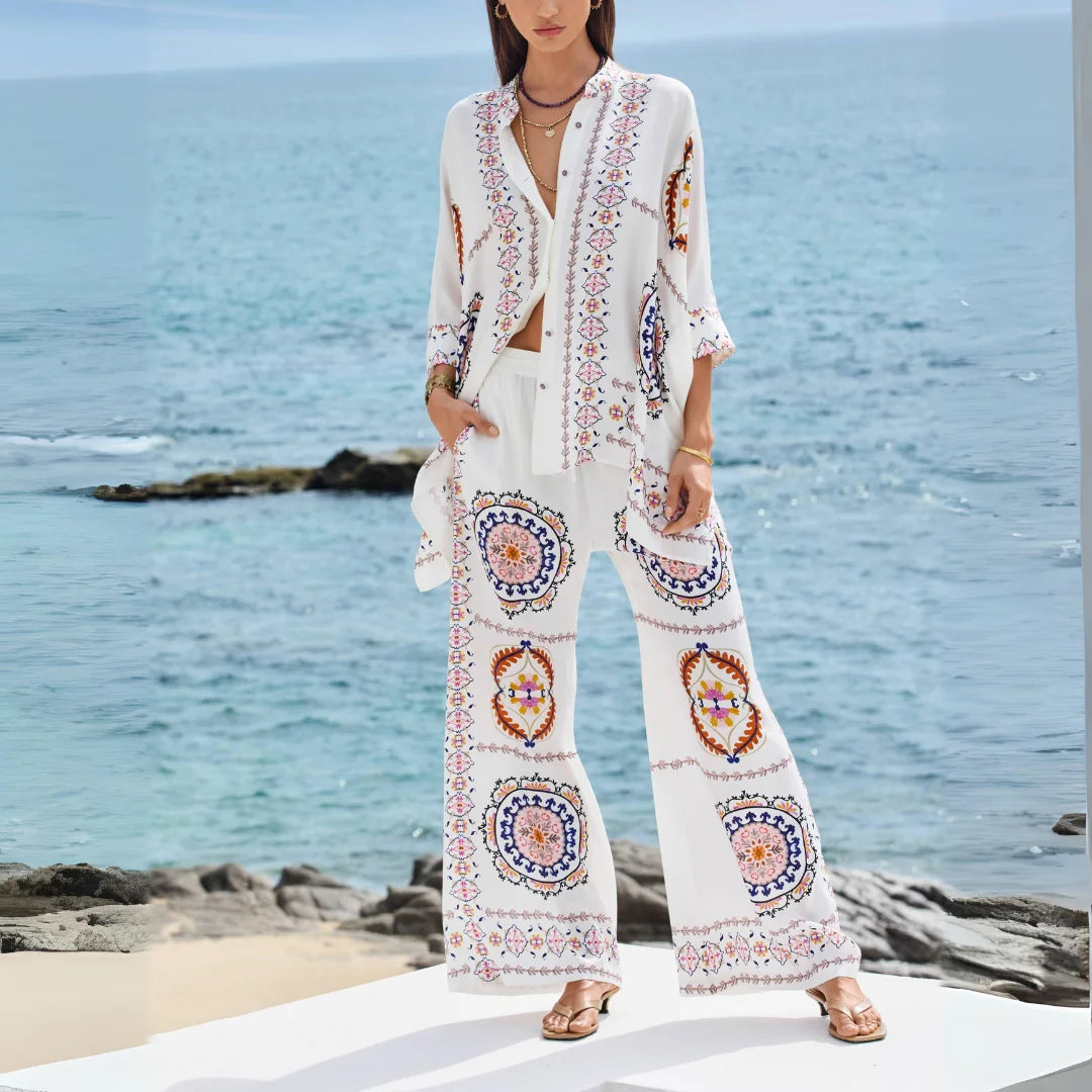 "Jasper bohemian set with floral embroidery, flowing skirt, and bell sleeves for versatile spring days."