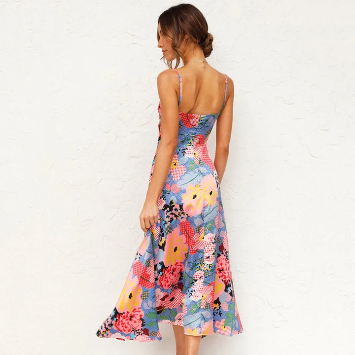 Flowy maxi dress with a beautiful floral print on soft and breathable fabric for a chic summer look.