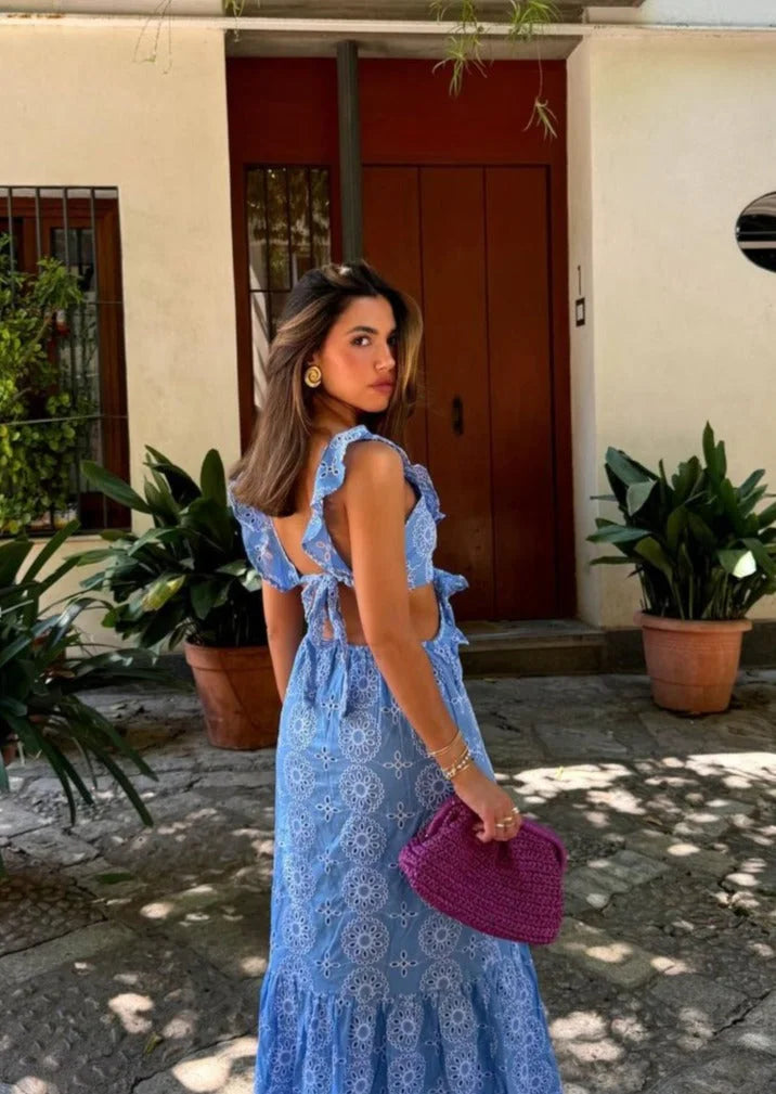 Blue patterned maxi dress with ruffles, made from lightweight and breathable fabric. Perfect for summer days or special…