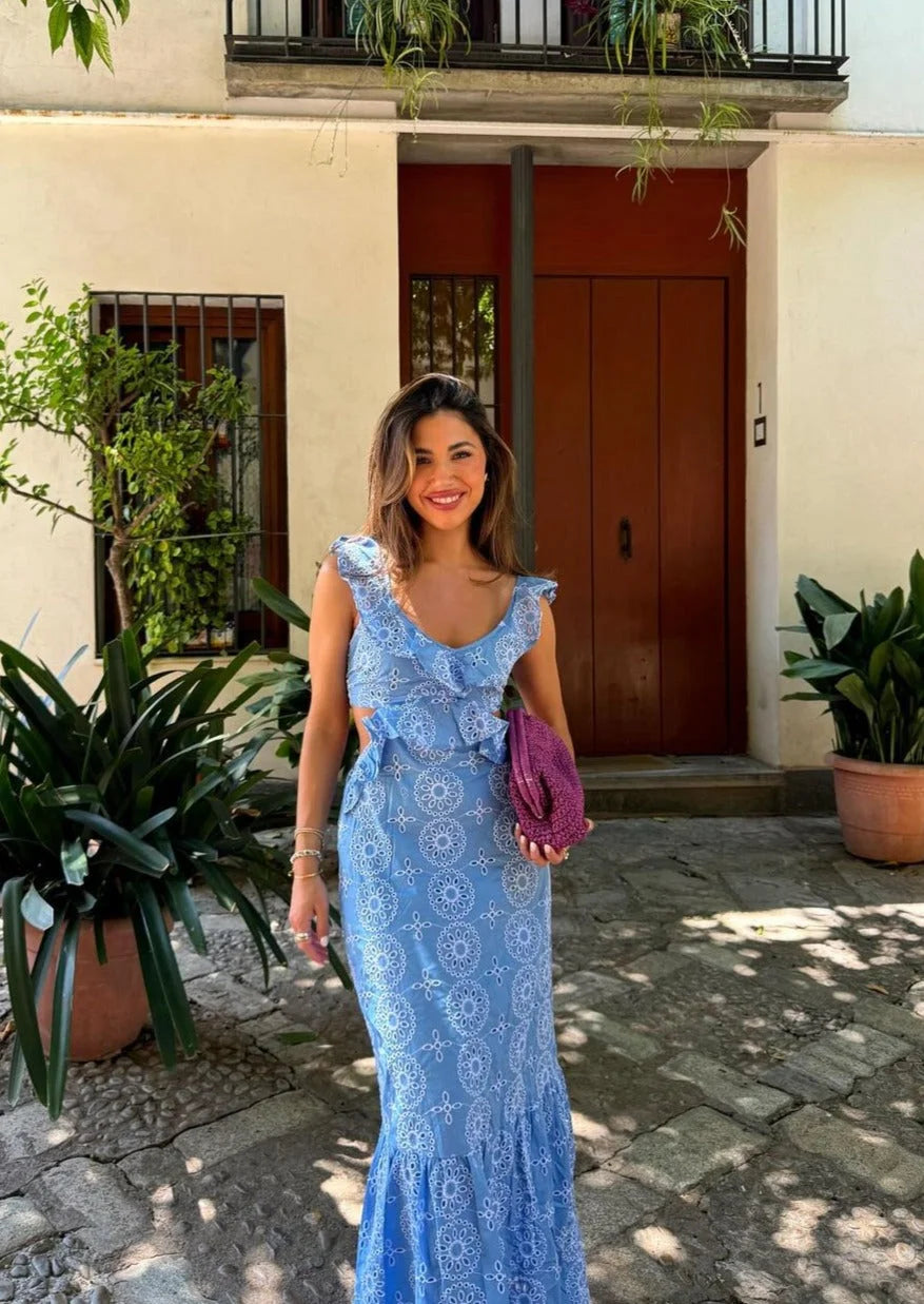 Blue maxi dress with ruffles, featuring a stylish pattern design. Made from lightweight and breathable fabric, perfect for…