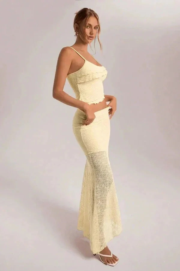 Cream lace crop top and skirt set for women, delicate and elegant with intricate lace details, perfect for a charming and…