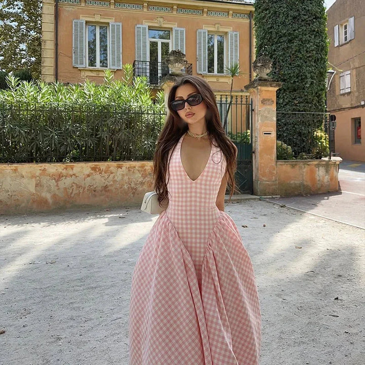 "Women's pink plaid dress midi with pockets, perfect for casual chic look in soft, comfortable fabric."