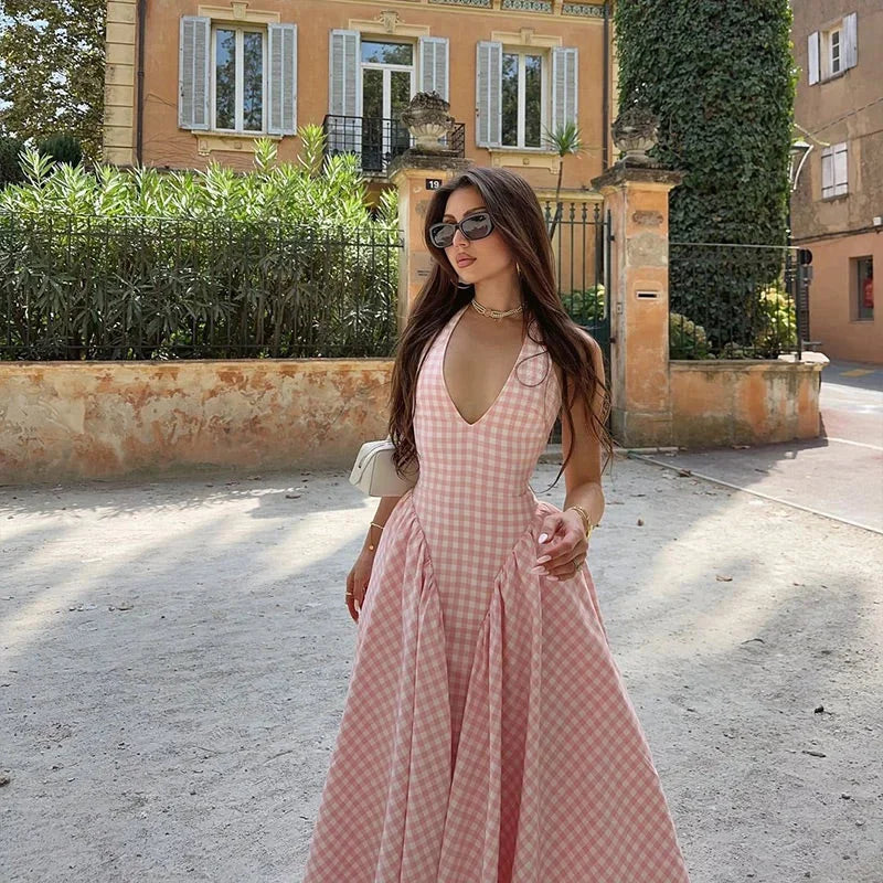 "Women's pink plaid midi dress with pockets, soft and comfortable, casual chic style for everyday wear."