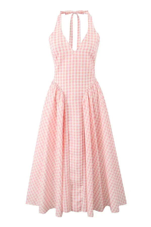 Women's pink plaid dress midi with pockets, made from soft cotton blend. Featuring a classic plaid pattern and convenient…