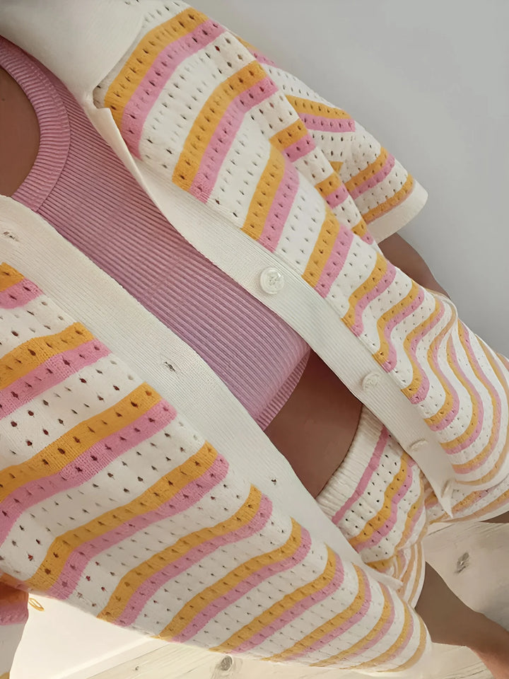Striped two-piece outfit with a breezy summer design, perfect for casual leisure.
