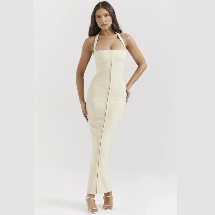 Ecru maxi dress featuring a sleek sleeveless design with a zipper detail, perfect for a casual yet stylish look.
