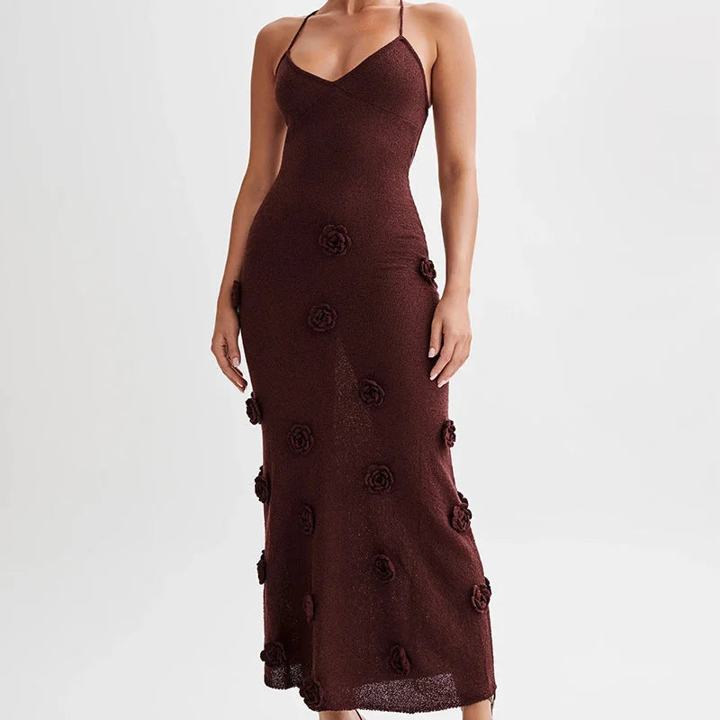 Floral embellished maxi dress in a flowing silhouette featuring delicate floral embroidery on a soft and lightweight fabric.