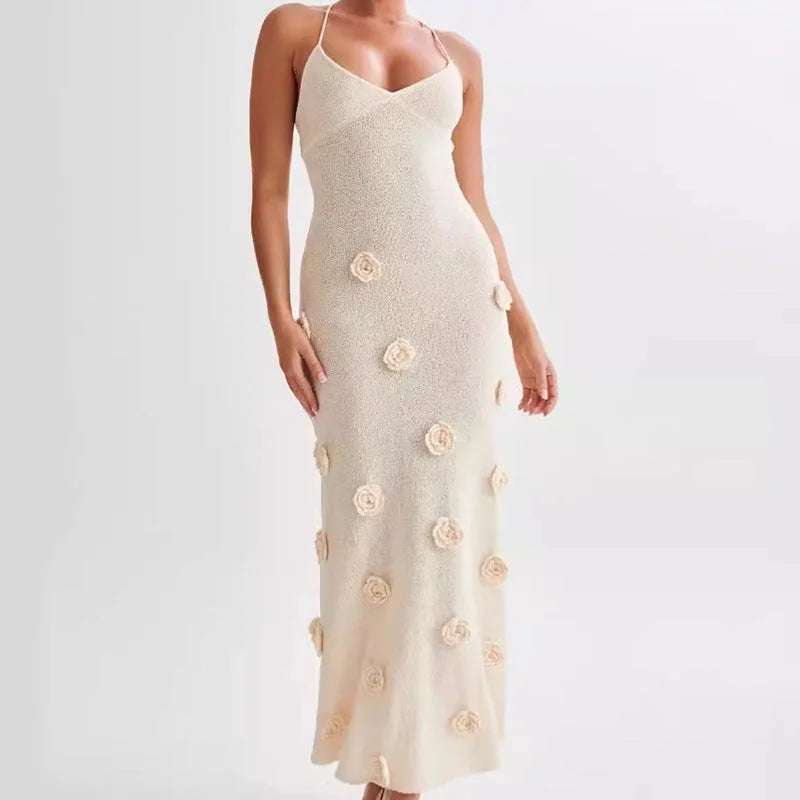Floral embellished maxi dress with intricate embroidery details, featuring a flowing silhouette perfect for special…