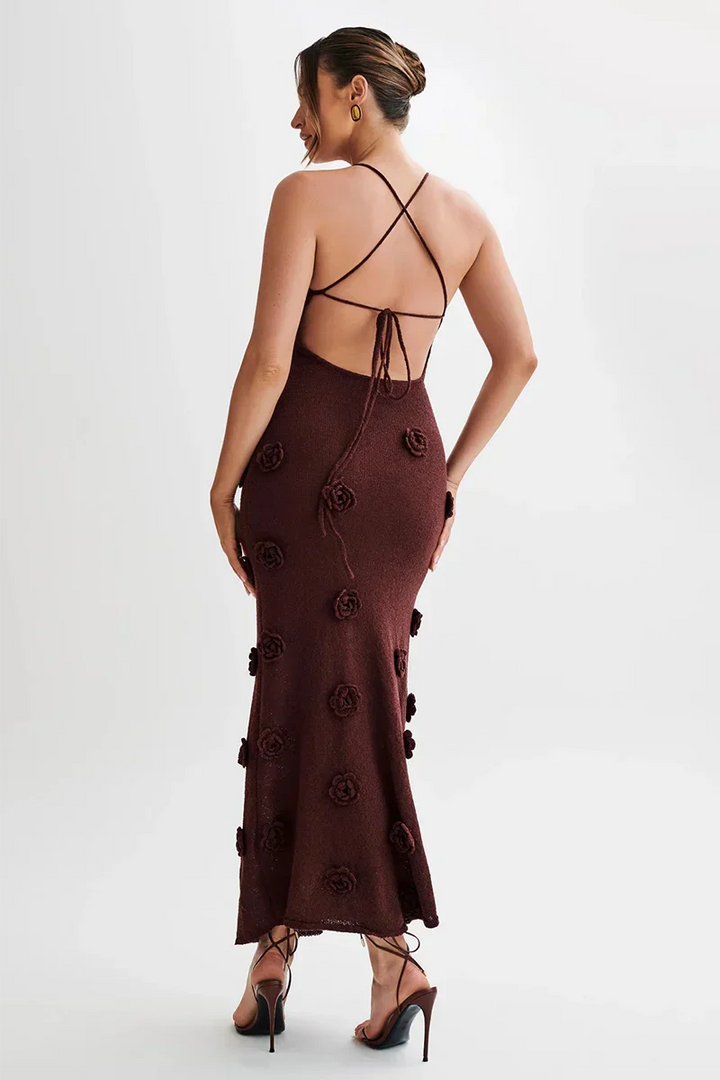 "Floral embellished maxi dress with mesh overlay, intricate embroidery, and plunging neckline by Jovi."