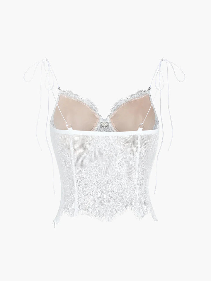 "Black lace camisole top with adjustable straps, intricate design."