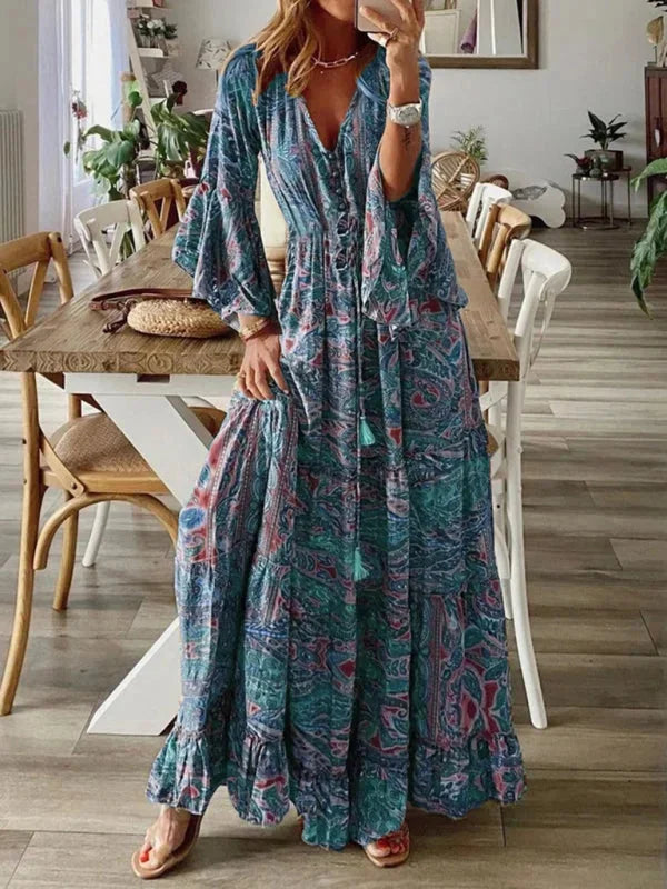 Blue bohemian dress with flared sleeves, made from lightweight cotton blend. Flowy and relaxed fit, perfect for a casual…