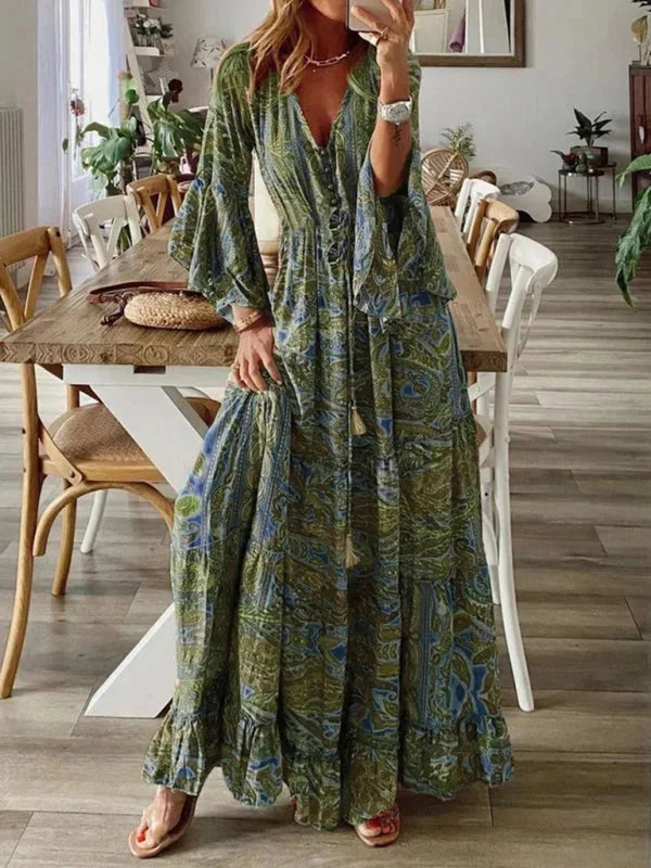 Light green bohemian dress with flared sleeves, adorned with intricate lace details, perfect for a relaxed and stylish look.