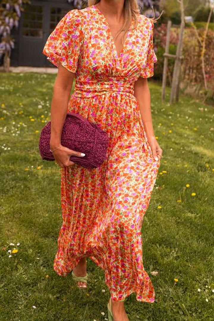 Floral maxi dress for women, featuring a vibrant flower pattern against a teal background, made from 100% breathable cotton…