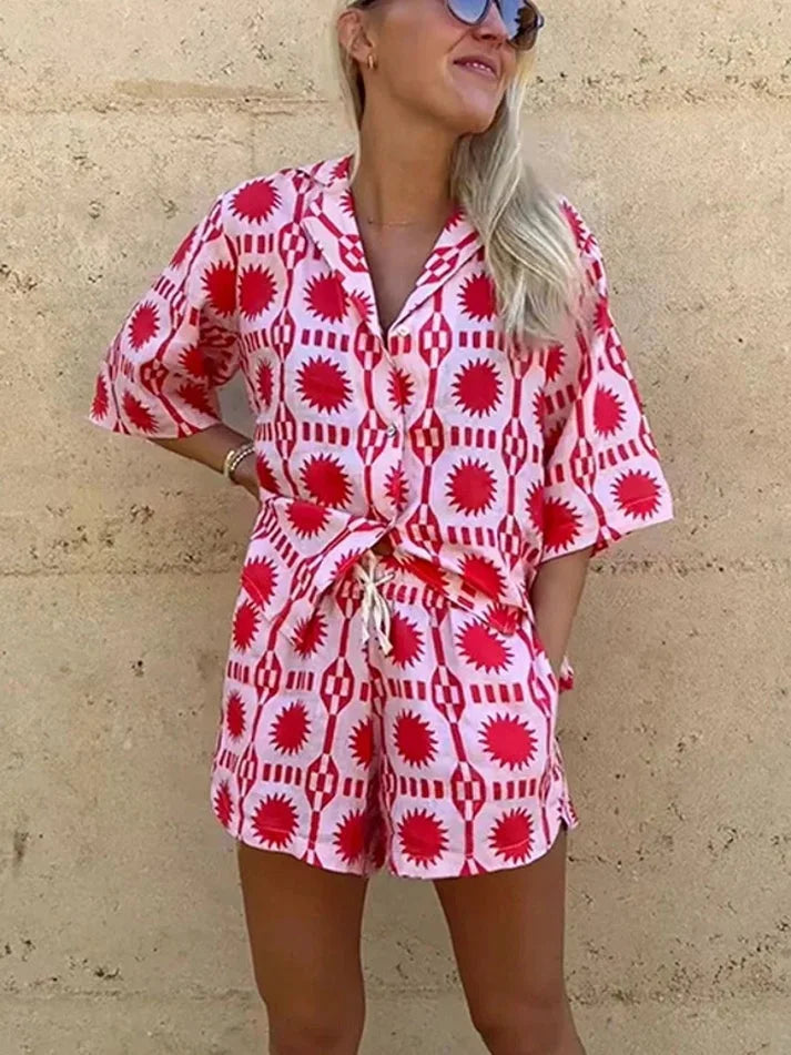 Pink short-sleeve shirt and shorts set by Kadence. Soft and breathable fabric with a ribbed texture. Ideal for casual summer…