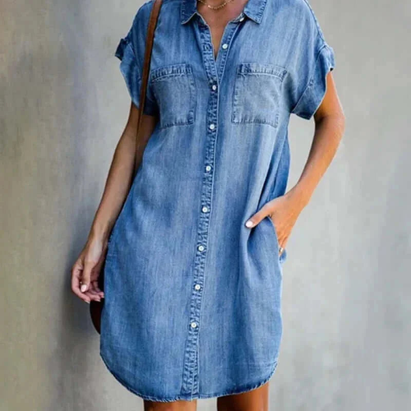 Denim dress with button-front closure and pockets, perfect for casual days.