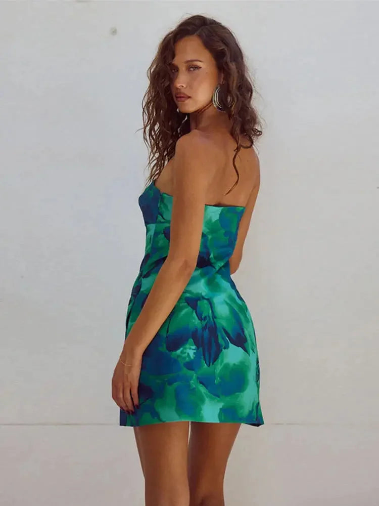 Strapless mini dress in vibrant floral design, perfect for summer.