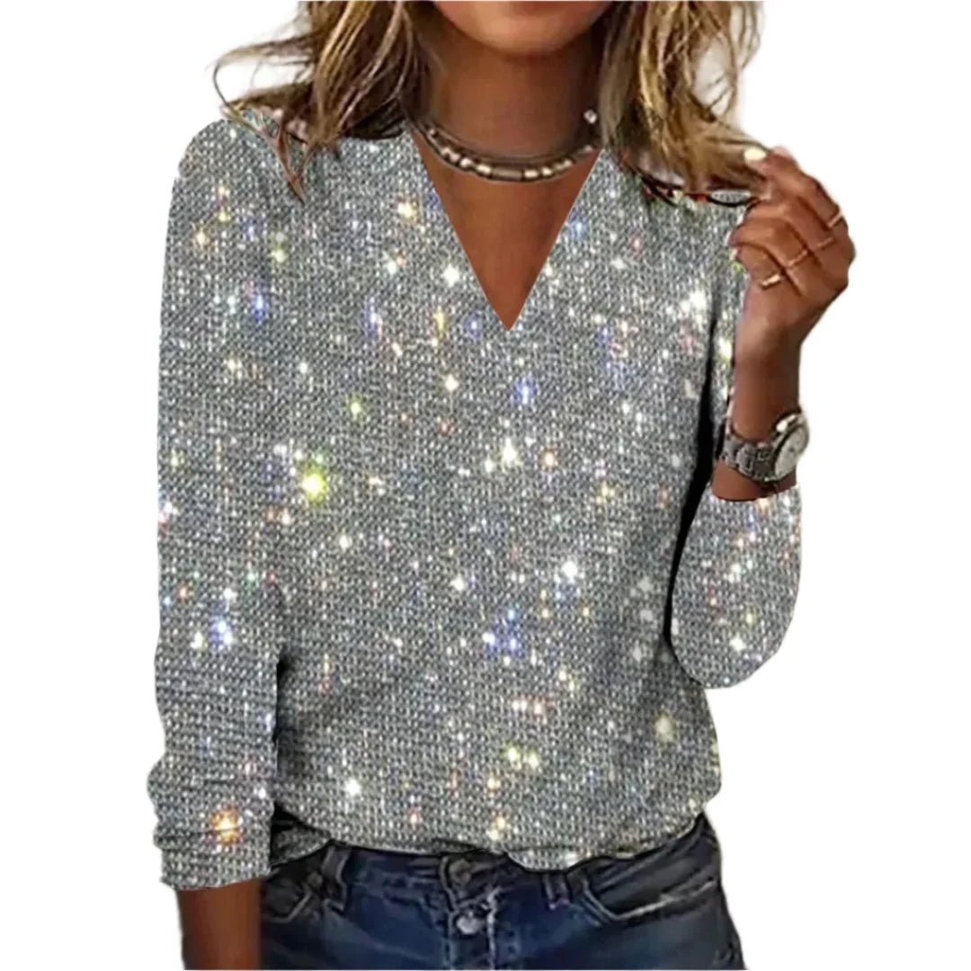 Silver sequin embellished V-neck top featuring shimmering design, perfect for a touch of elegance.
