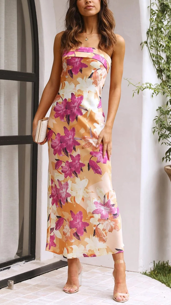 "Strapless floral maxi dress in soft chiffon fabric with elegant design, perfect for special occasions."